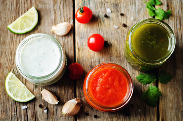Variation of sauces for meat, poultry or fish. Tomato, Cilantro Parsley and Greek yogurt Lime sauces.