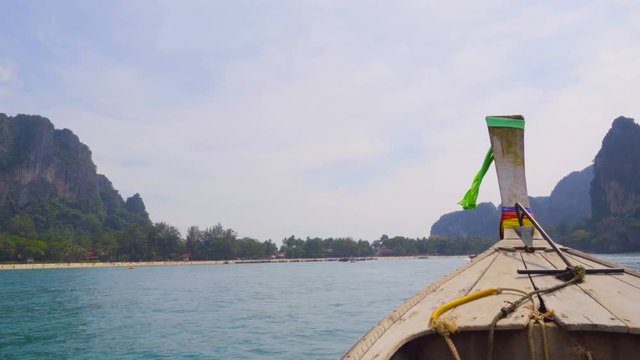 A trip on a Thai long-tailed boat on the Andaman see. POV. 