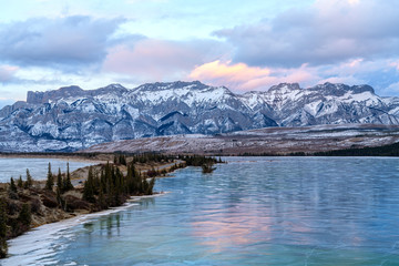 Winter landscape of the frozen Talbot Lake in Jasper National Park, Alberta, Canada