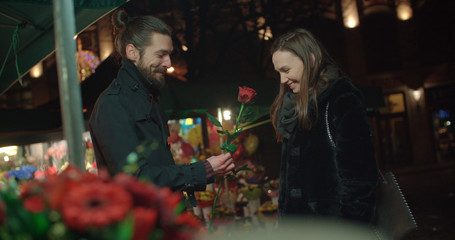 Beautiful young couple on a night date.