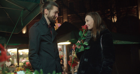 Beautiful young couple on a night date.