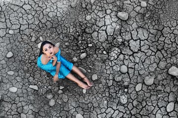 The model sits on the dried soil