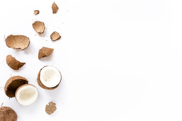 Coconuts on white background. The apartment lay, top view