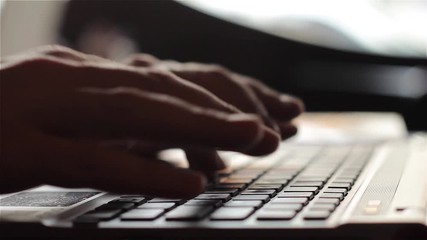 Man Using His Laptop Computer