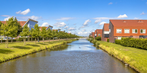 Fototapeta premium River in modern suburb neigborhood