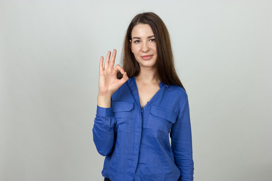 Woman showing ok sign