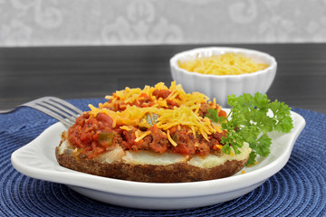 Chili stuffed baked potato