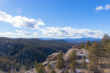 Scenic view of lush trees and mountain horizons