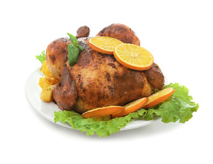 Plate with delicious whole roasted chicken on white background