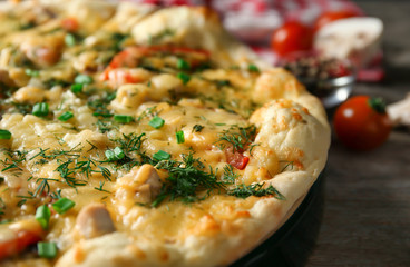 Delicious cheese pizza on table, closeup. Fresh from oven