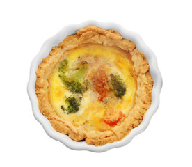 Ramekin with tasty broccoli quiche on white background