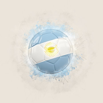 Grunge football with flag of argentina