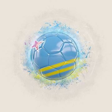 Grunge football with flag of aruba