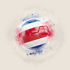 Naklejka premium Grunge football with flag of costa rica