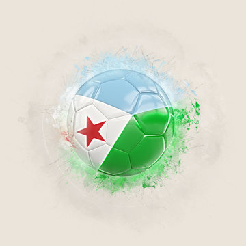 Grunge football with flag of djibouti