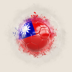 Grunge football with flag of taiwan