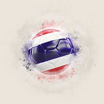 Grunge football with flag of thailand