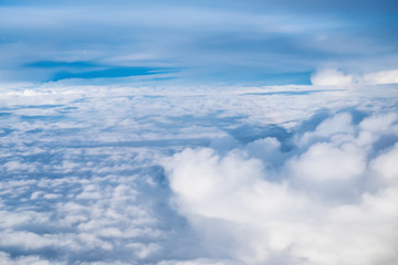 View of sky above the clouds from plane