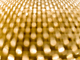 Gold mesh net with focus and shallow depto fo field, gold bokeh net pattern - 190832107