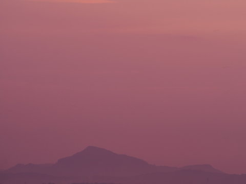 The high mountains and the evening sky with a variety of beautiful colors are something amazing nature creation