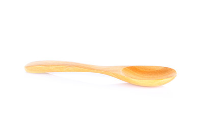 Wooden spoon on white background