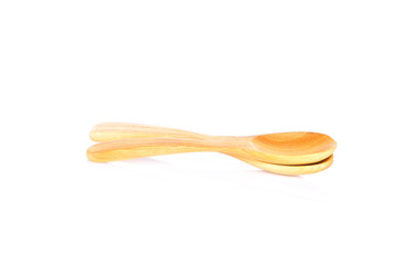 Wooden spoon on white background