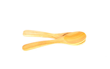 Wooden spoon on white background