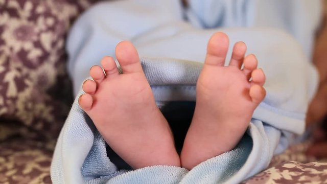 Close up of newborn baby feet