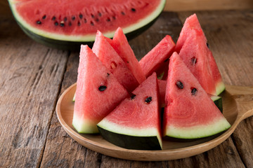 Watermelon on wooden table background