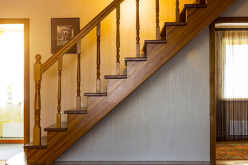 Wooden interior staircase to the second floor.