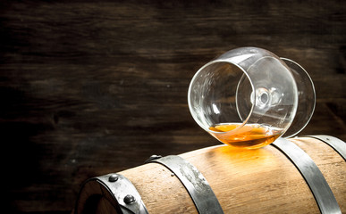 barrel with a glass of cognac.