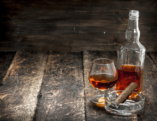 French cognac with a cigar.