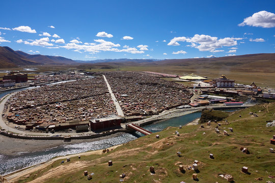 View of the Yarchen Gar Monastery with many shacks for monks in Garze Tibetan, Sichuan, China.