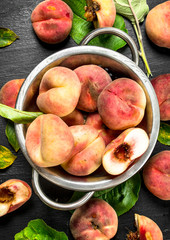 Fresh peaches in a bowl.