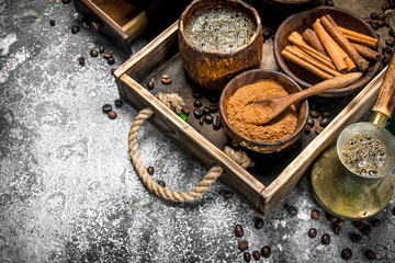 Coffee background. Welded coffee in a Turkish with sugar, cinnamon and coffee beans.