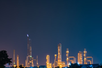 Oil and gas refinery plant area at twilight