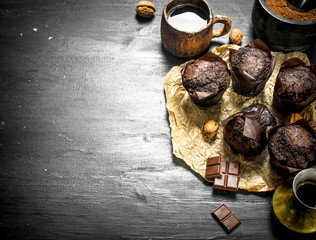 Chocolate muffins with fragrant coffee.