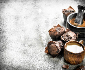 Chocolate muffins with coffee and cocoa.