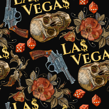 Embroidery skulls and guns, dice seamless pattern. Las Vegas slogan. Casino background. Wild west embroidery old revolvers, roses, human skulls, gangster gothic Las Vegas pattern