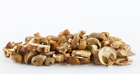 Dried mushrooms for cooking. On a white background.
