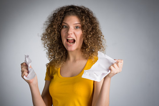 Woman Tearing Paper