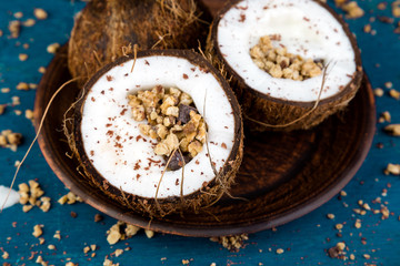 Healthy breakfast in coconut bowl.
