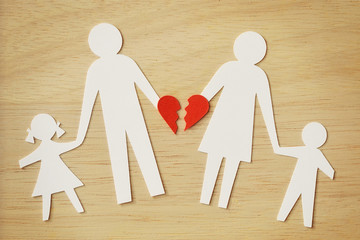 Paper chain family cut-out with broken heart - Divorce and broken family concept