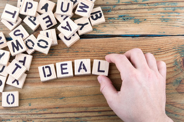 deal. Wooden letters on the office desk, informative and communication background.