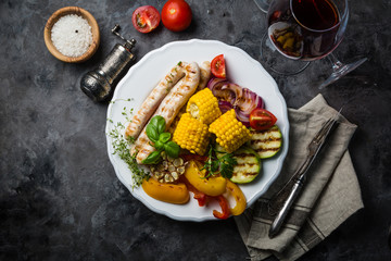 Barbeque sausages with vegetables