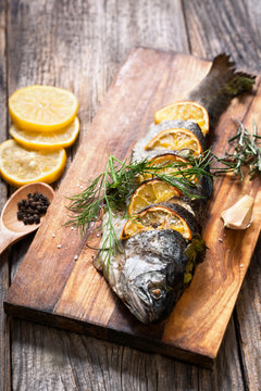 grilled fish with spices and lemon