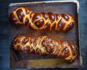 tasty challah on a wooden background