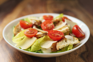 caesar salad with cherry tomatoes closeup