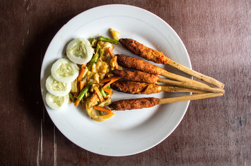 Indonesian dish Lombok: Sate Pusut (marinated meat mix on stick).