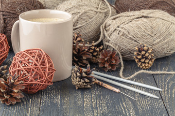 Natural wool for knitting on table